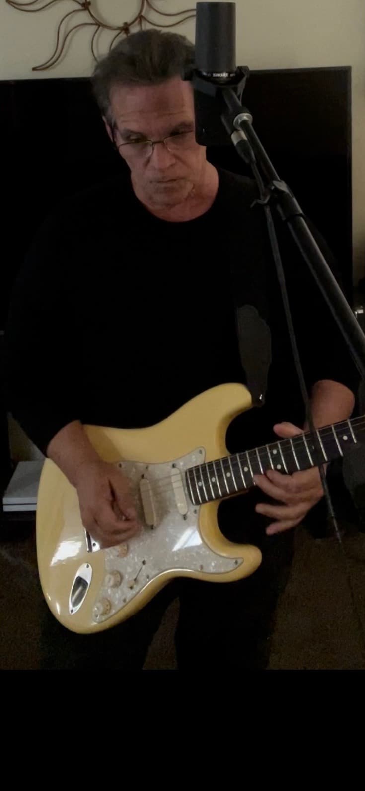 Mark performing on stage